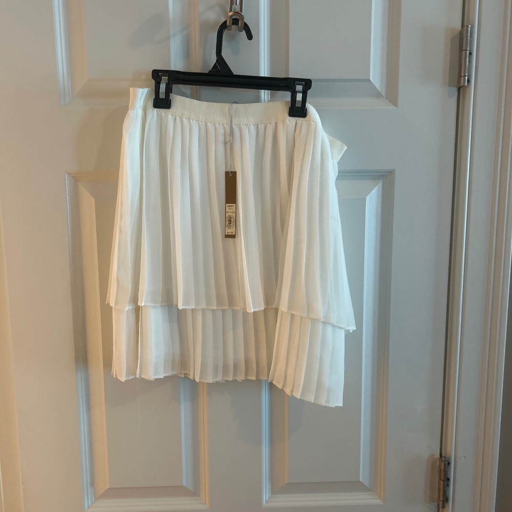 White pleated skirt